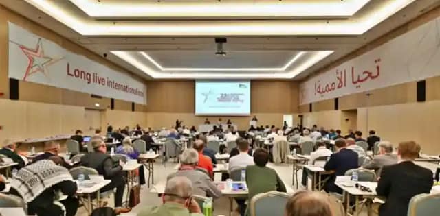 Foto de la sesión del 23 encuentro internacional de comunistas