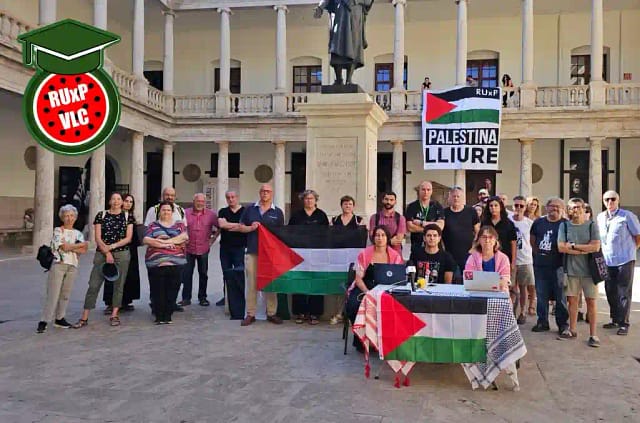 Participantes en el encierro de la Calle La Nau de ValenciaParticipantes en el encierro de la Calle La Nau de Valencia